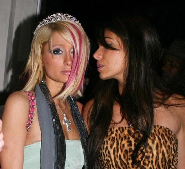 Why so sad, Paris? Paris Hilton leaves the uber fashionable Villa lounge hand-in-hand with Brittny Gastineau