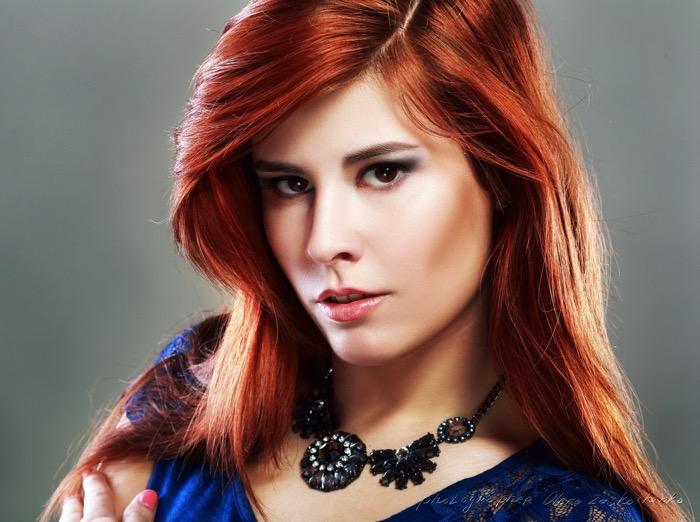 Fine Art Portrait of a young woman with red hair and brown eyes